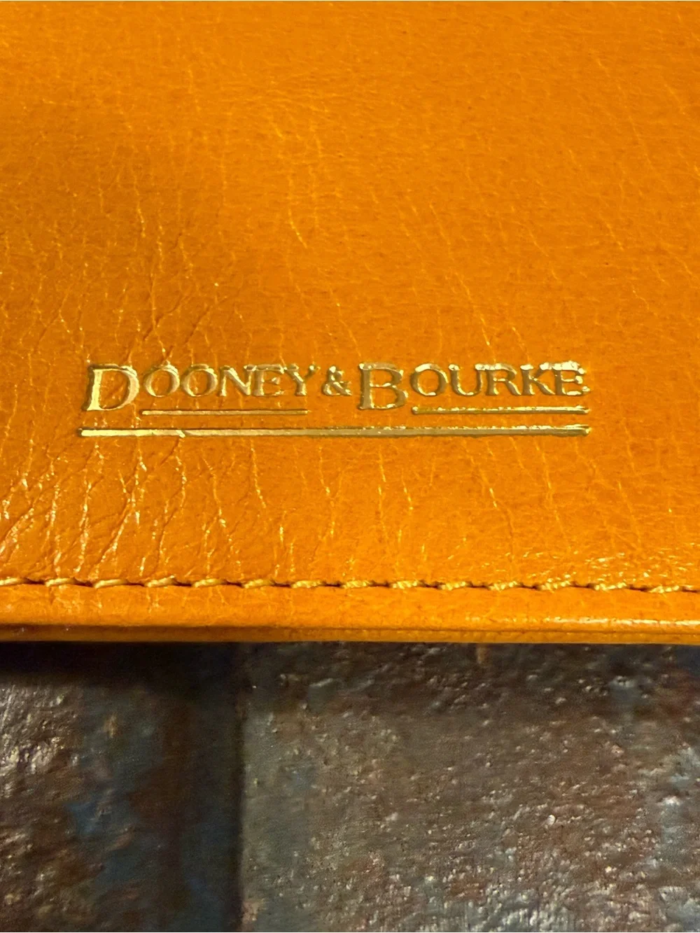 Yellow leather Dooney & Bourke note holder